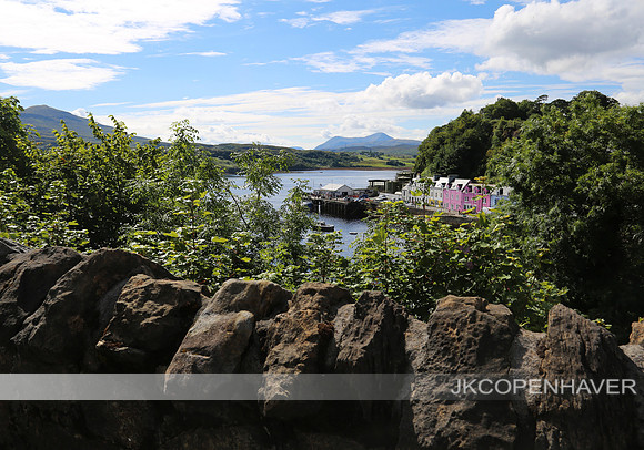 Scotland Colorful Town Peak thru Bushes