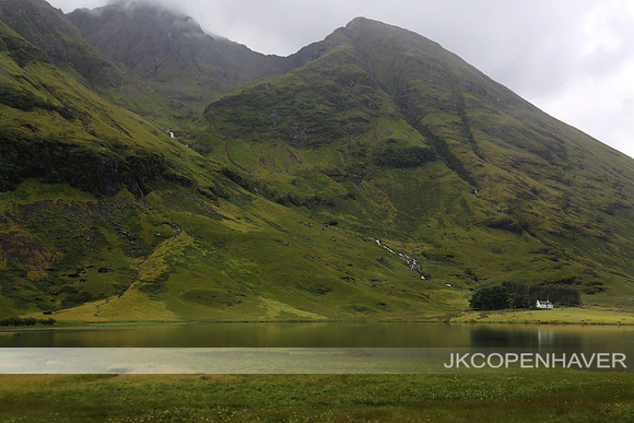Scotland Green Mountains with Tiny House